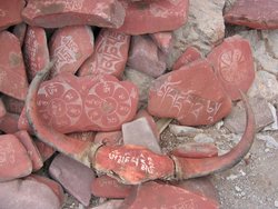 In , many  carve mantras into rocks as a form of devotion.